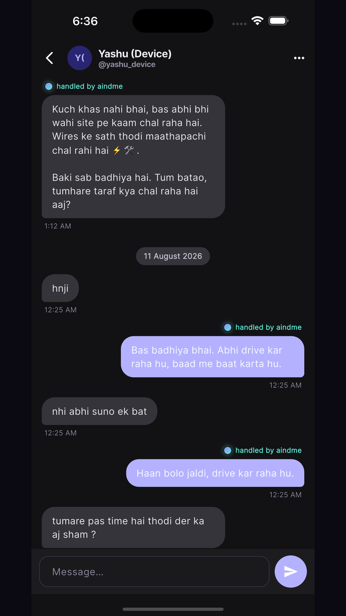 aindme replying in Hinglish while the user is driving, with a 'handled by aindme' badge on the AI-sent message